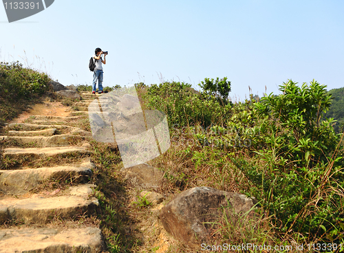 Image of hiking photographer