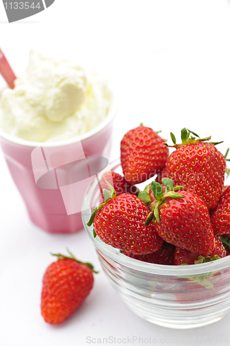 Image of Bowl of strawberries with whipped cream