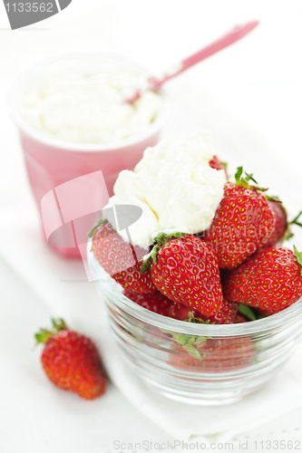 Image of Bowl of strawberries with whipped cream