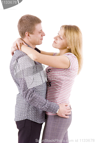 Image of young couple hugging