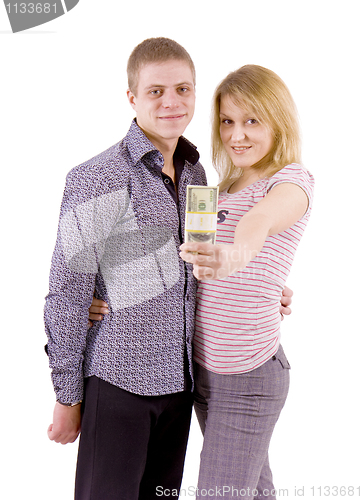 Image of young couple with money