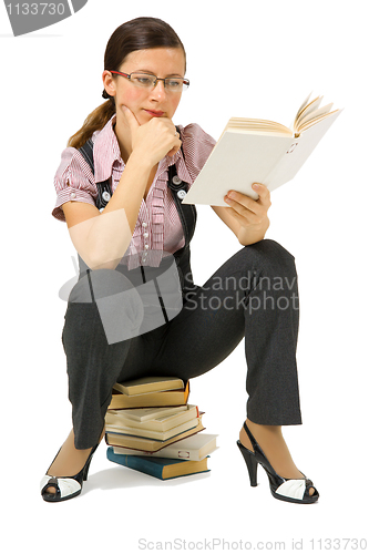 Image of girl in glasses to book