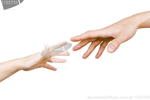 Image of child's hand reaches for the men's hand