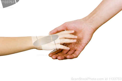 Image of child's hand reaches for the men's hand