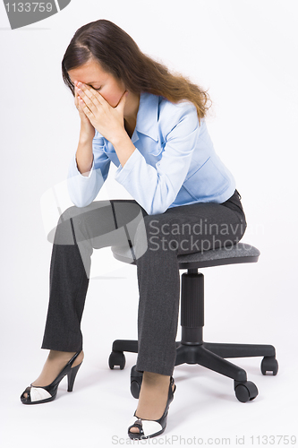 Image of tired businesswoman