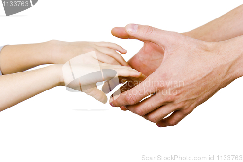 Image of man holding a child by the hand