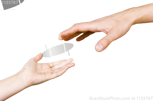 Image of child's hand reaches for the men's hand