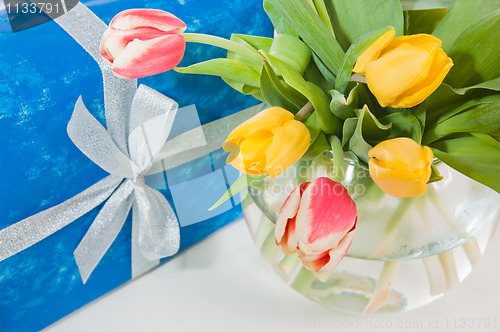 Image of Bouquet of tulips and gift
