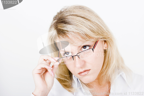 Image of strong girl with glasses