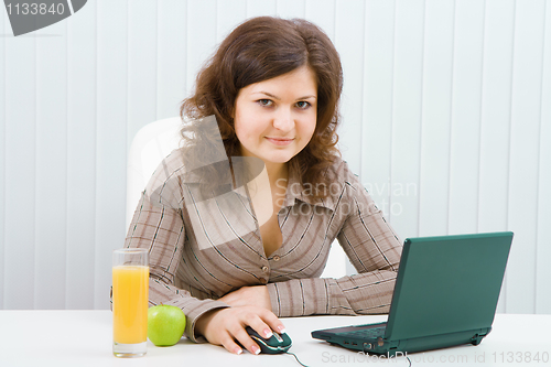 Image of business woman at office