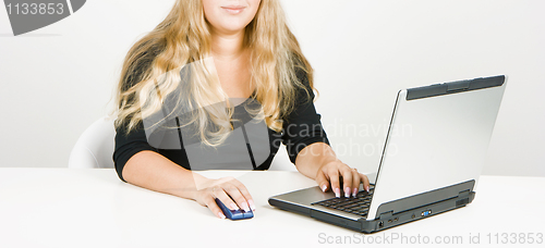 Image of blonde in office