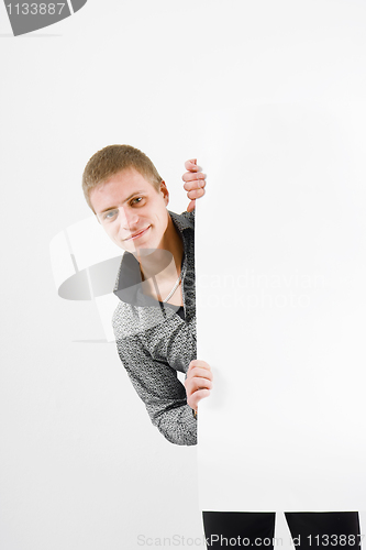 Image of young man with a placard