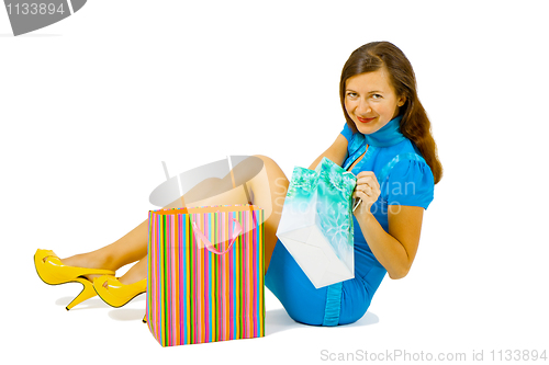 Image of girl in a bright dress with shopping