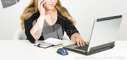 Image of blonde in office