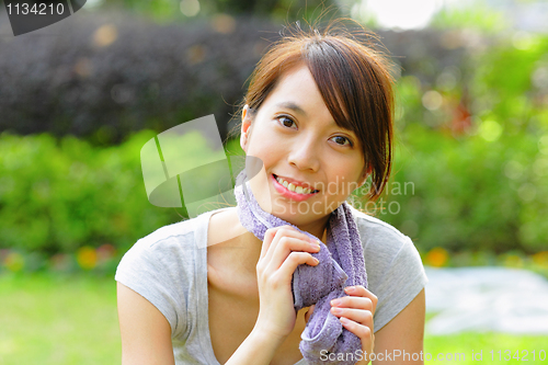 Image of sporty asian girl in outdoors