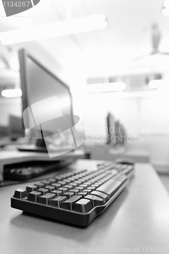 Image of workplace room with computers