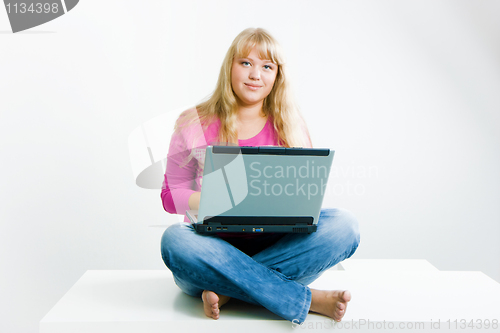 Image of blonde with a laptop