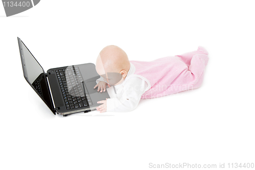 Image of baby with laptop