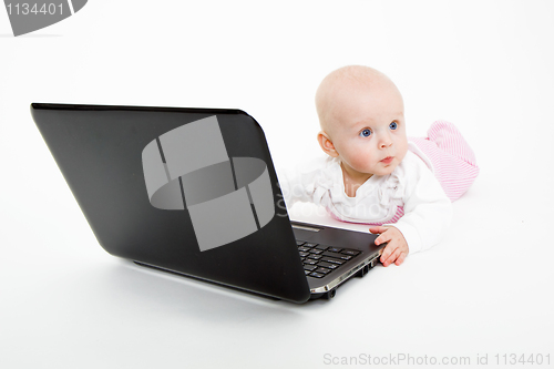 Image of baby with laptop