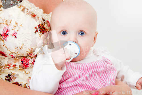 Image of infant with a pacifier