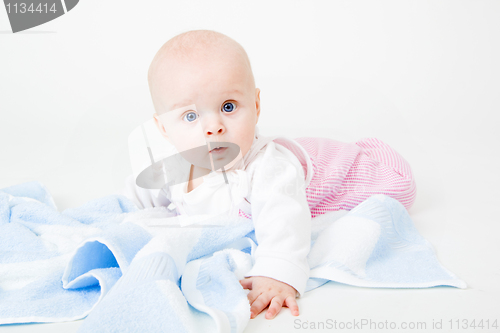 Image of baby with a towel