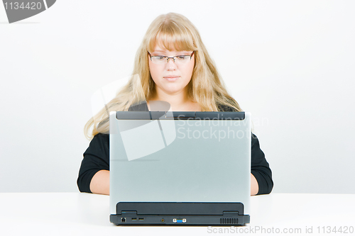 Image of blonde with a laptop