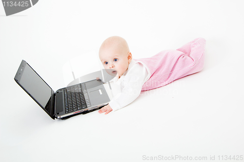 Image of baby with laptop