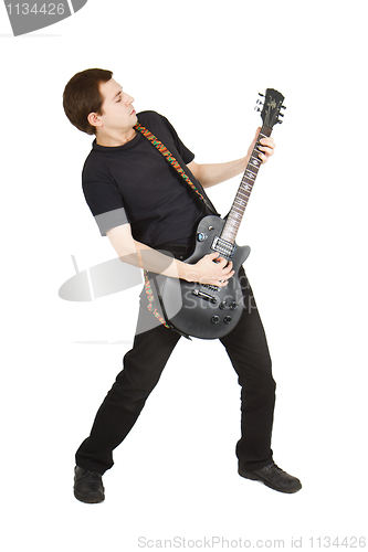 Image of young man with a guitar