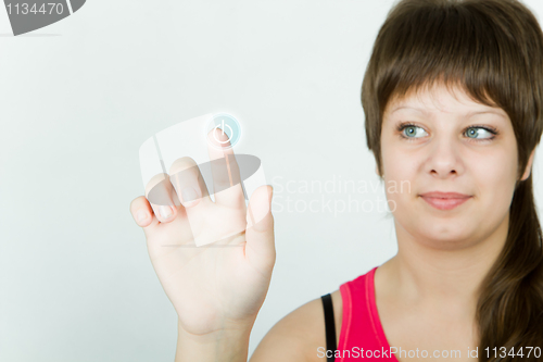 Image of girl presses the button