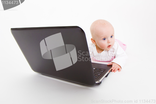 Image of baby with laptop