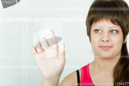 Image of girl presses the button