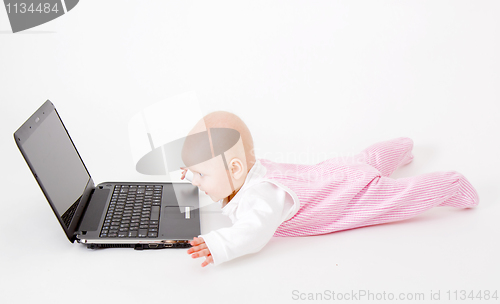 Image of baby with laptop