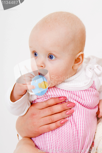 Image of infant with a pacifier