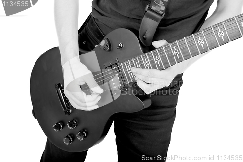 Image of singer with a guitar