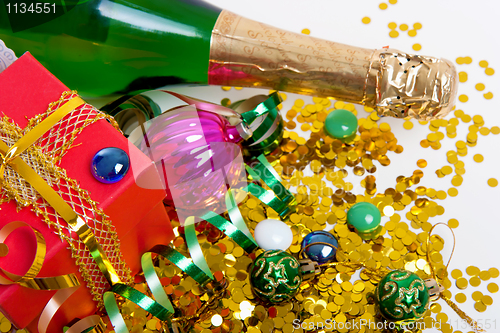Image of Christmas gift, jewelry and champagne