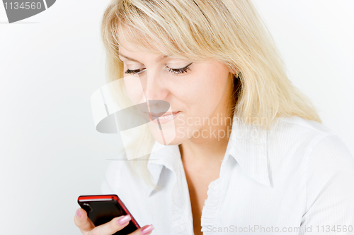 Image of smiling blonde girl with phone