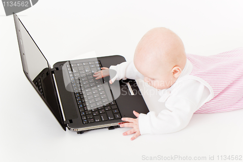 Image of baby with laptop