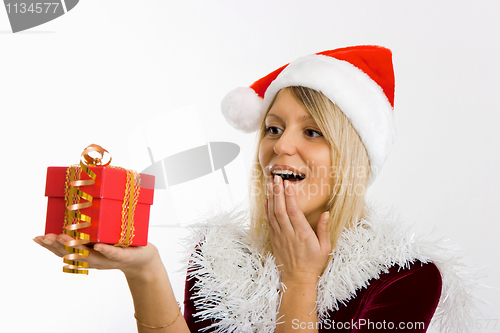 Image of admiring a girl with a gift