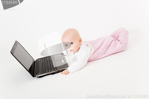 Image of baby with laptop