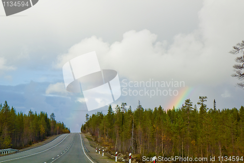 Image of rainbow over the road