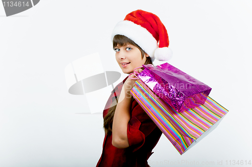 Image of blue-eyed girl with a New Year Shopping