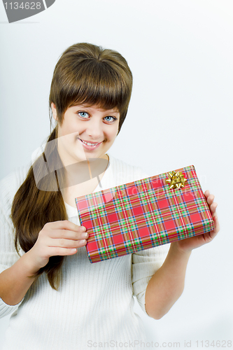 Image of young woman with a gift