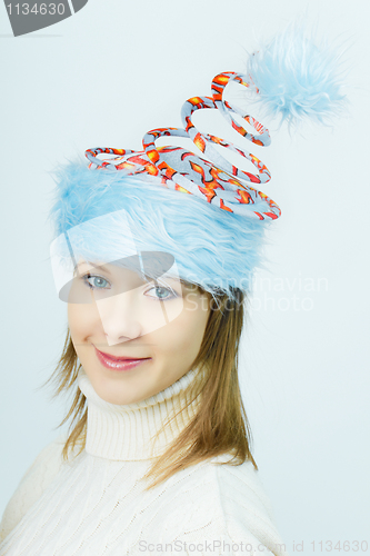 Image of portrait of smiling girl in Christmas hats