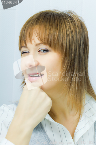 Image of portrait of a beautiful girl wink