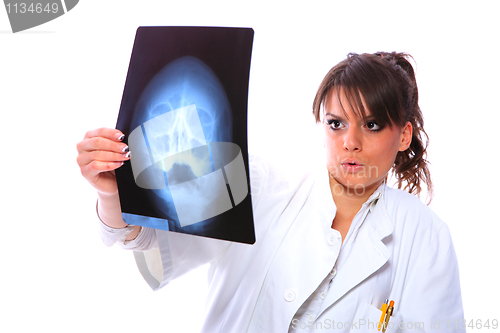 Image of Female doctor looking at an x-ray