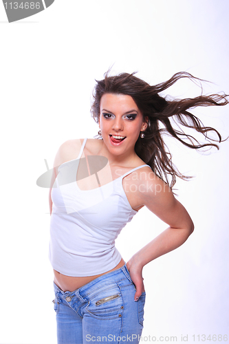 Image of young woman in jeans and t shirt