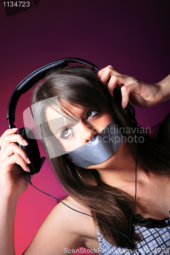 Image of girl enjoys music