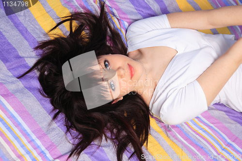 Image of woman in bed