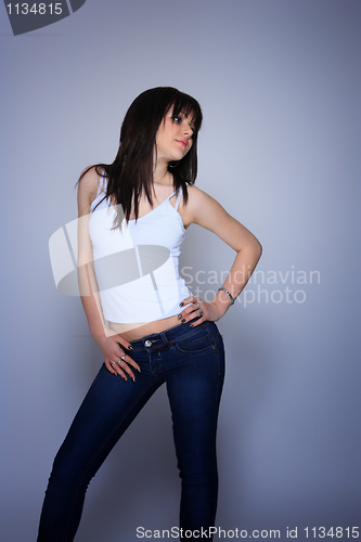 Image of young woman in jeans and t shirt