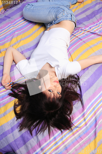 Image of woman in bed